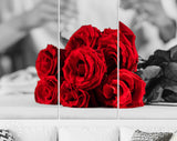 Red Roses Canvas Print // Couple Clinking Glasses Celebrating In Restaurant // Red Roses on Black and White Background Wall Art